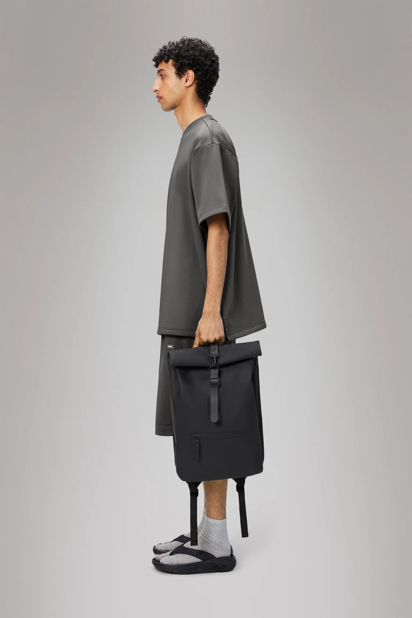 RAINS Black Rolltop Rucksack