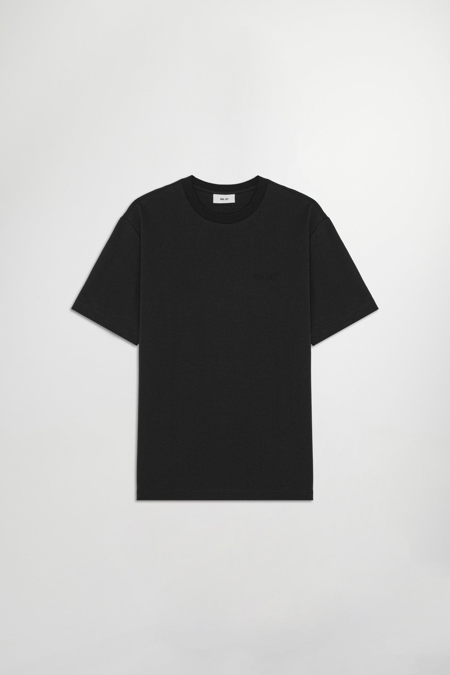Black t-shirt on a light gray background