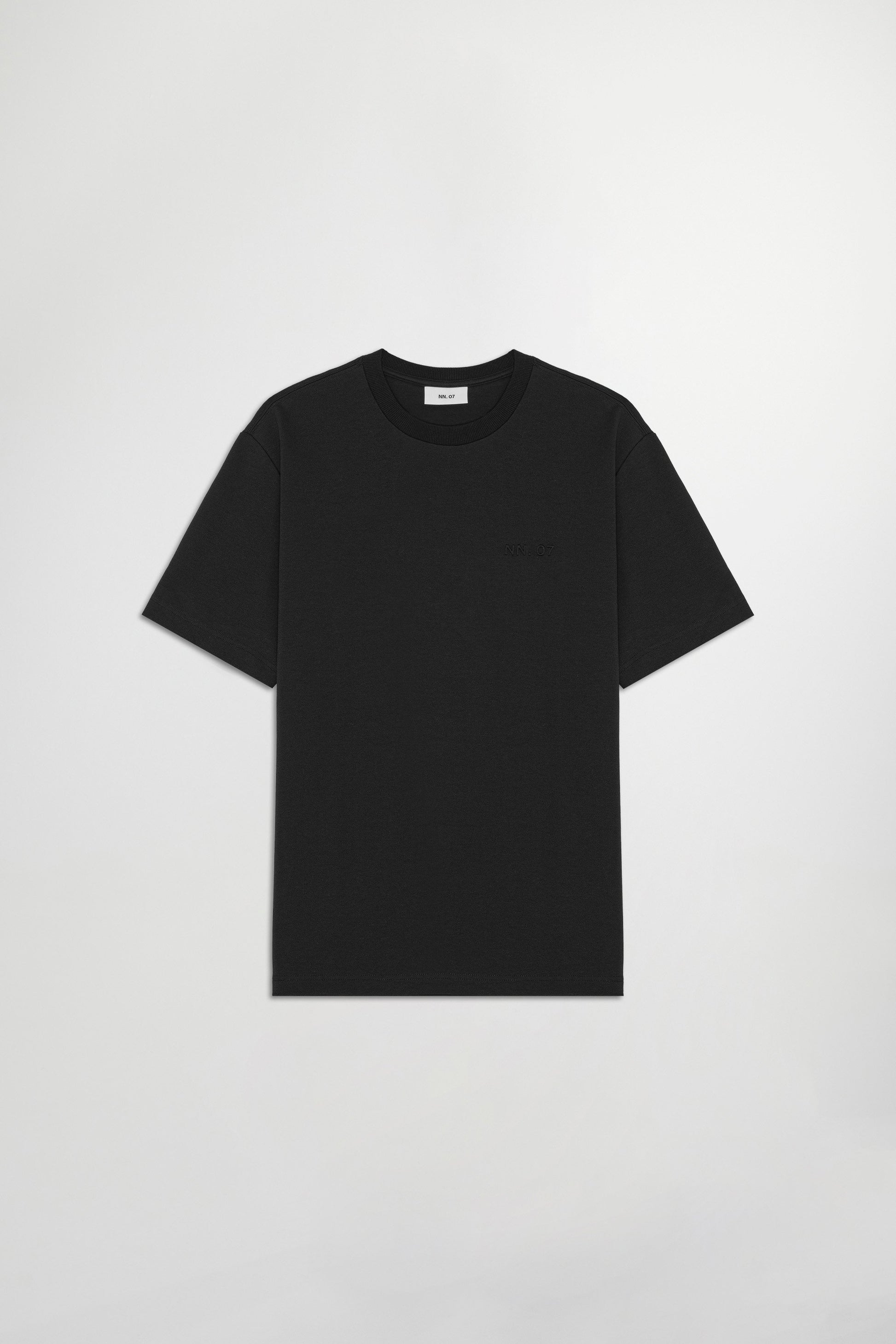 Black t-shirt on a light gray background